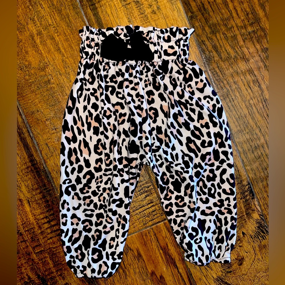 Leopard Pants Size 6-9m ( NEW)